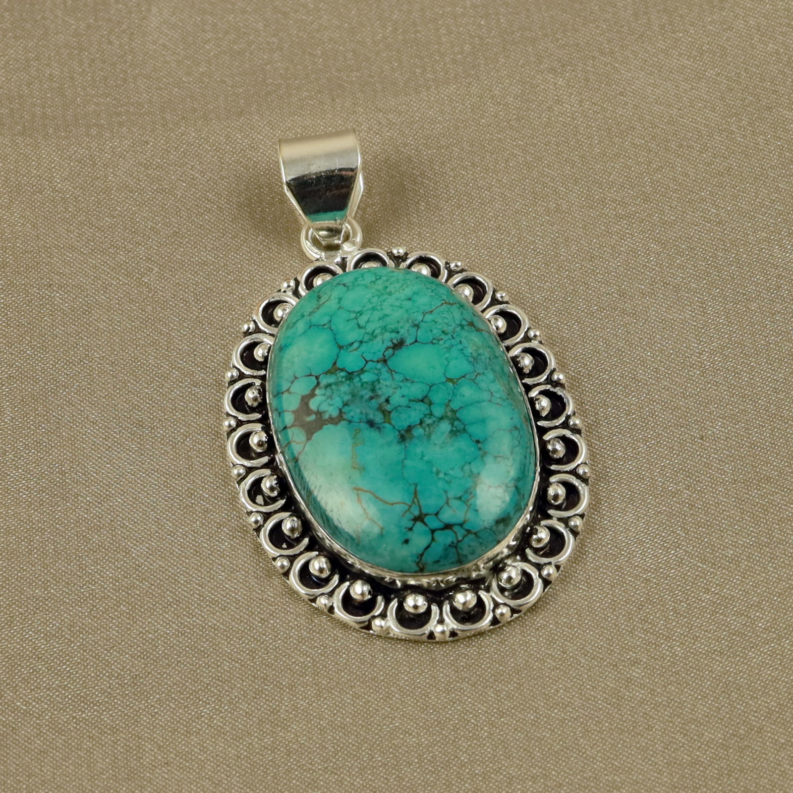 Natural Turquoise Sterling Silver Plated Handmade Pendant: Product ID: 260518134503 Product - Handmade Silver Plated Pendant Metal - 92.5 Sterling Silver Plated Pendant Size - 4x3CM Gemstone - Turquoise Gemstone Origin - Tibet Gemstone Shape - Oval Pendant We