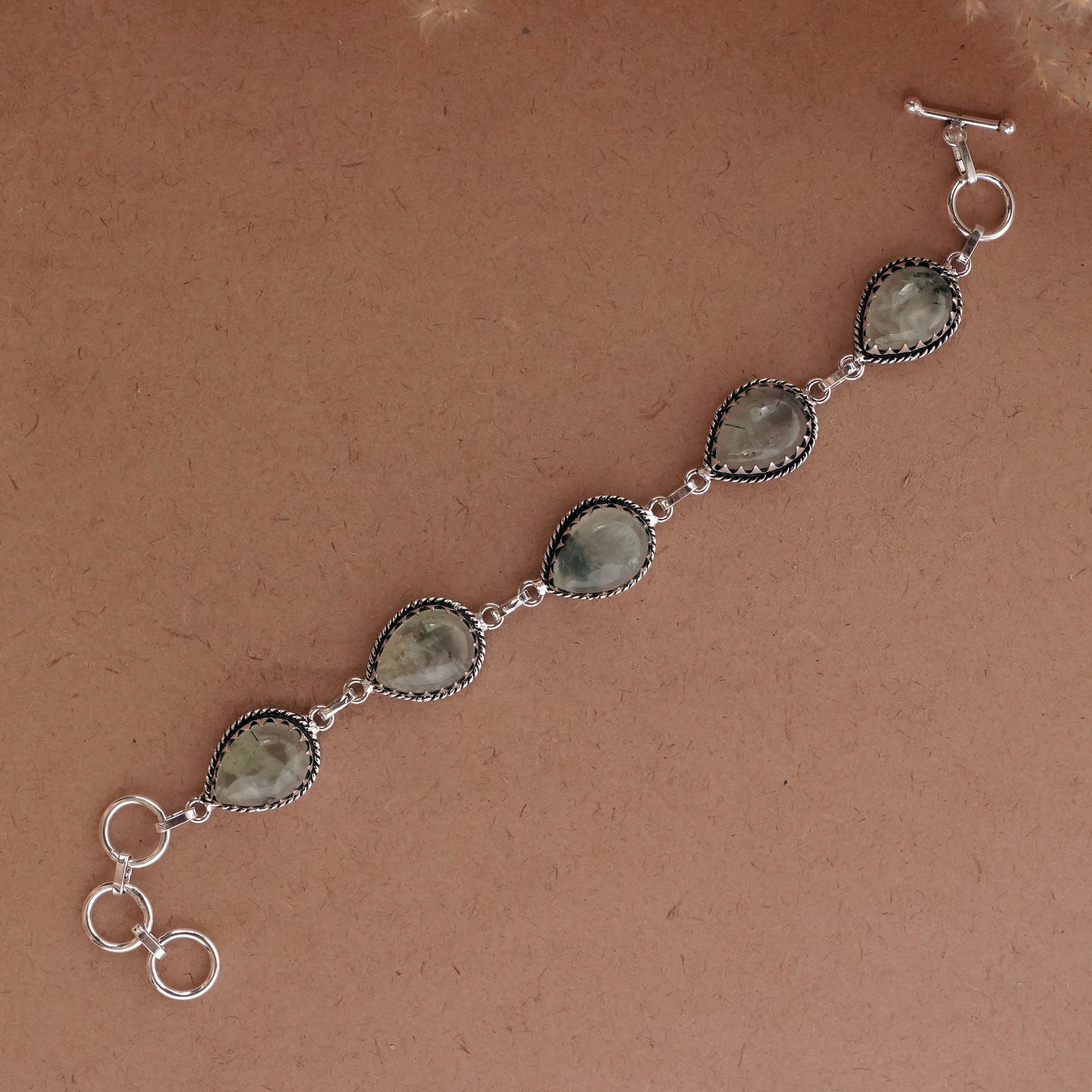 Natural Prehnite Sterling Silver Plated Handmade Bracelet: Product ID: 260502115010 Product - Handmade Silver Plated Bracelet Metal - 92.5 Sterling Silver Plated Bracelet Length - 6 Inch + 2 Inch Gemstone - Prehnite Gemstone Size -12X16 ( 5 Stone) Gemstone Or