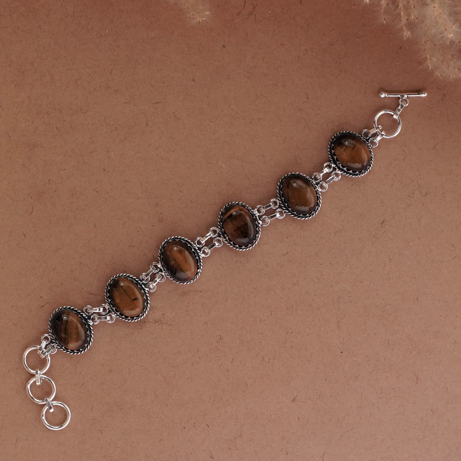 Natural Tiger Eye Sterling Silver Plated Handmade Bracelet: Product ID: 260502114341 Product - Handmade Silver Plated Bracelet Metal - 92.5 Sterling Silver Plated Bracelet Length - 6 Inch + 2 Inch Gemstone - Tiger Eye Gemstone Size -12X16 ( 6 Stone) Gemstone O