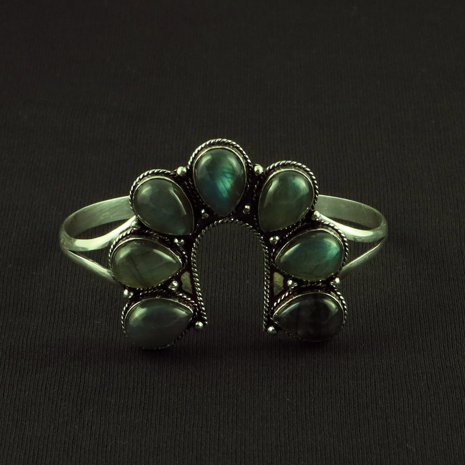 Natural Labradorite Sterling Silver Plated Handmade Cuff Bangle: Product ID: 260617115409 Product - Handmade Silver Plated Cuff Bangle Metal - 92.5 Sterling Silver Plated Bangle Size - 7x5 CM (Adjustable) Gemstone - Labradorite Gemstone Origin - Canada Gemstone Siz