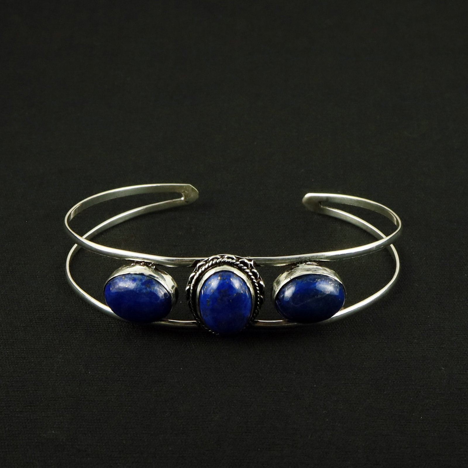 Natural Lapis Lazuli Silver Plated Handmade Cuff Bangle: Product ID: 260612170905 Product - Handmade Silver Plated Cuff Bangle Metal - 92.5 Sterling Silver Plated Bangle Size - 7.5x5.5 CM (Adjustable) Gemstone - Lapis Lazuli Gemstone Origin - Afghanistan Ge