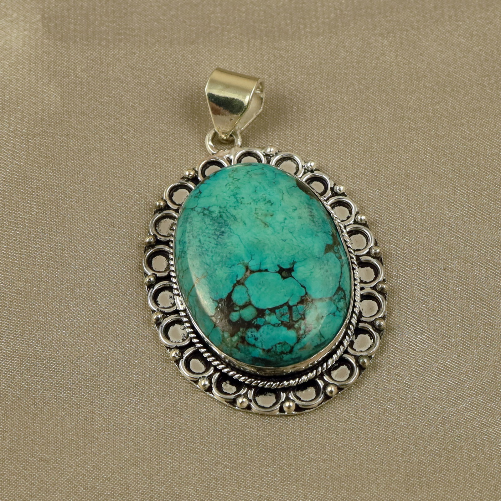 Natural Turquoise Sterling Silver Plated Handmade Pendant: Product ID: 260518134254 Product - Handmade Silver Plated Pendant Metal - 92.5 Sterling Silver Plated Pendant Size - 4.5x3.5CM Gemstone - Turquoise Gemstone Origin - Tibet Gemstone Shape - Oval Pendan