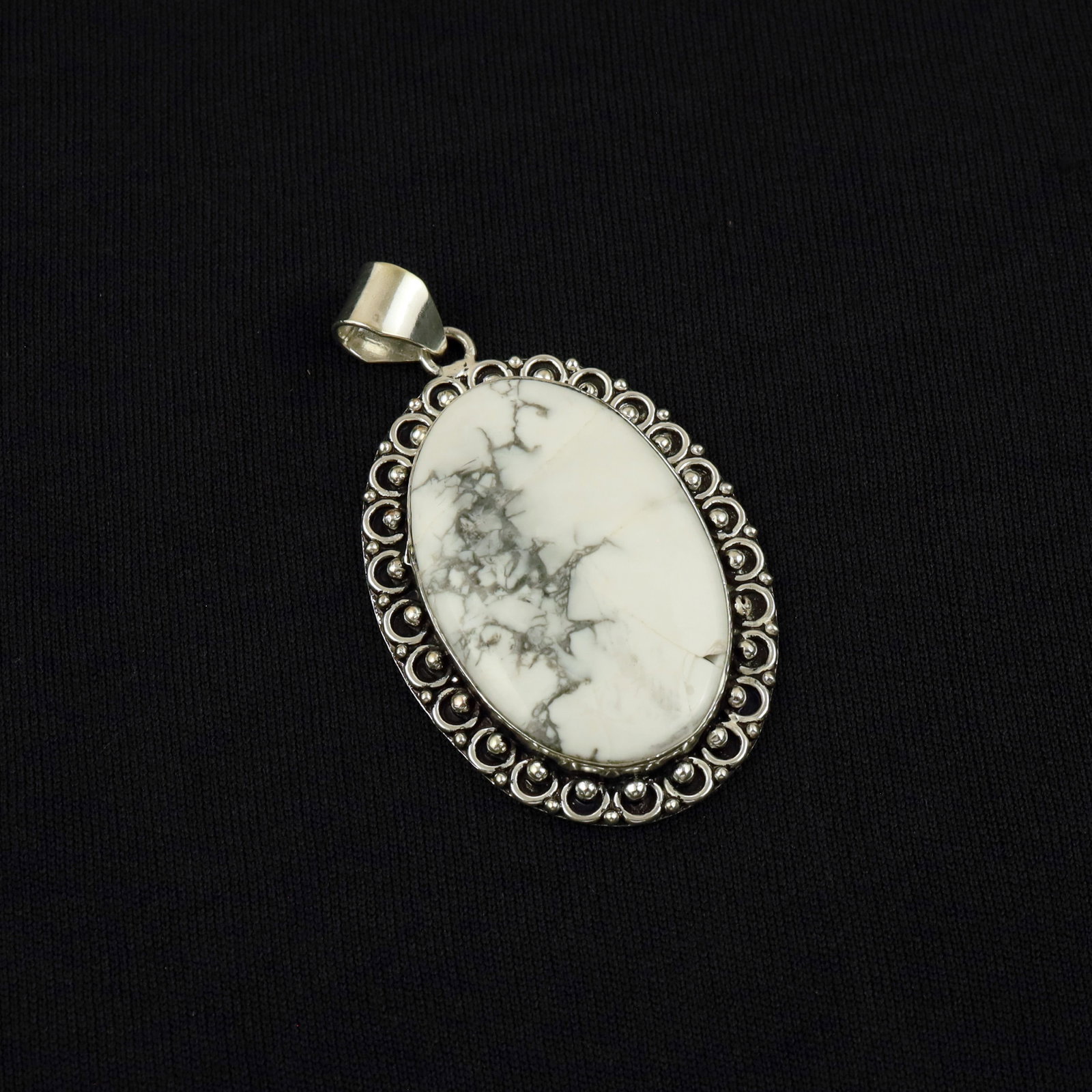 Natural Howlite Sterling Silver Plated Handmade Asian Pendant: Product ID: 260513105444 Product - Handmade Silver Plated Pendant Metal - 92.5 Sterling Silver Plated Pendant Size - 5x3.5 CM Gemstone - Howlite Gemstone Origin - Canada Gemstone Shape - Oval Pendant 