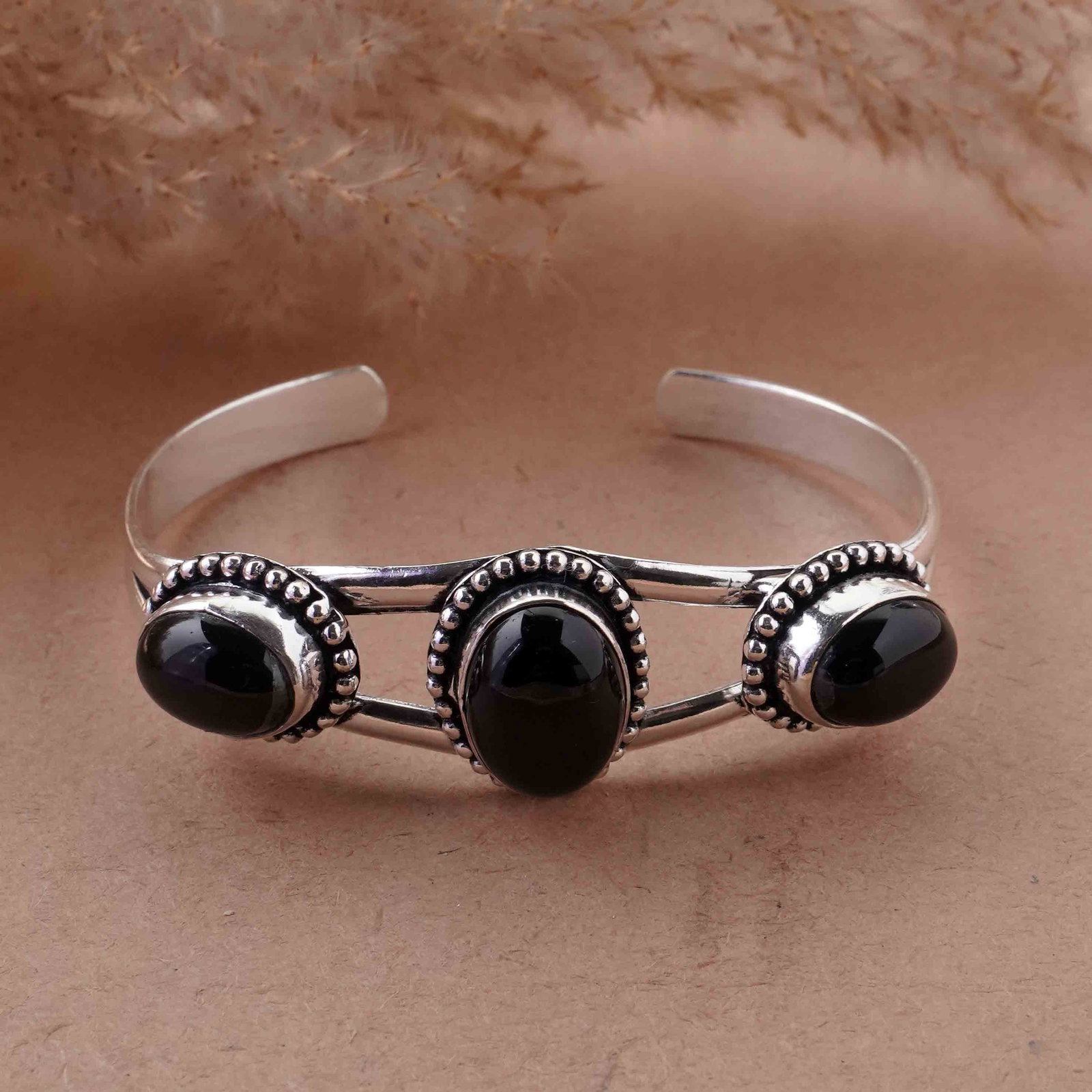 Natural Black Onyx Sterling Silver Plated Handmade Cuff Bangle: Product ID: 260429153046 Product - Handmade Silver Plated Cuff Bangle Metal - 92.5 Sterling Silver Plated Bangle Size - 6.5x4.5 CM (Adjustable) Gemstone - Black Onyx Gemstone Origin - India Gemstone S