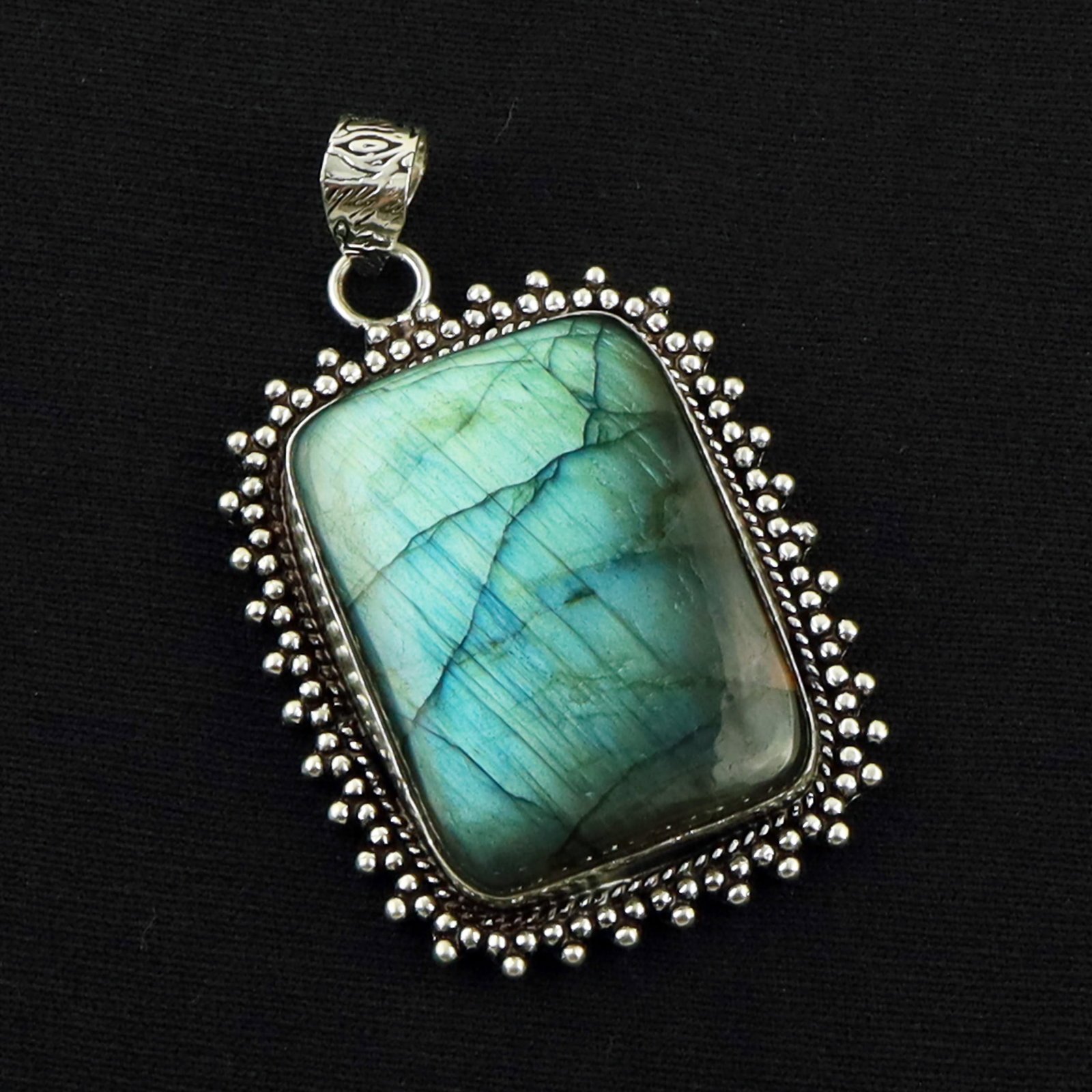 Natural Labradorite Sterling Silver Plated Handmade Pendant: Product ID: 260619171917 Product - Handmade Silver Plated Pendant Metal - 92.5 Sterling Silver Plated Pendant Size - 3.5X2.5 CM Gemstone - Labradorite Gemstone Origin - Canada Gemstone Shape - Square 