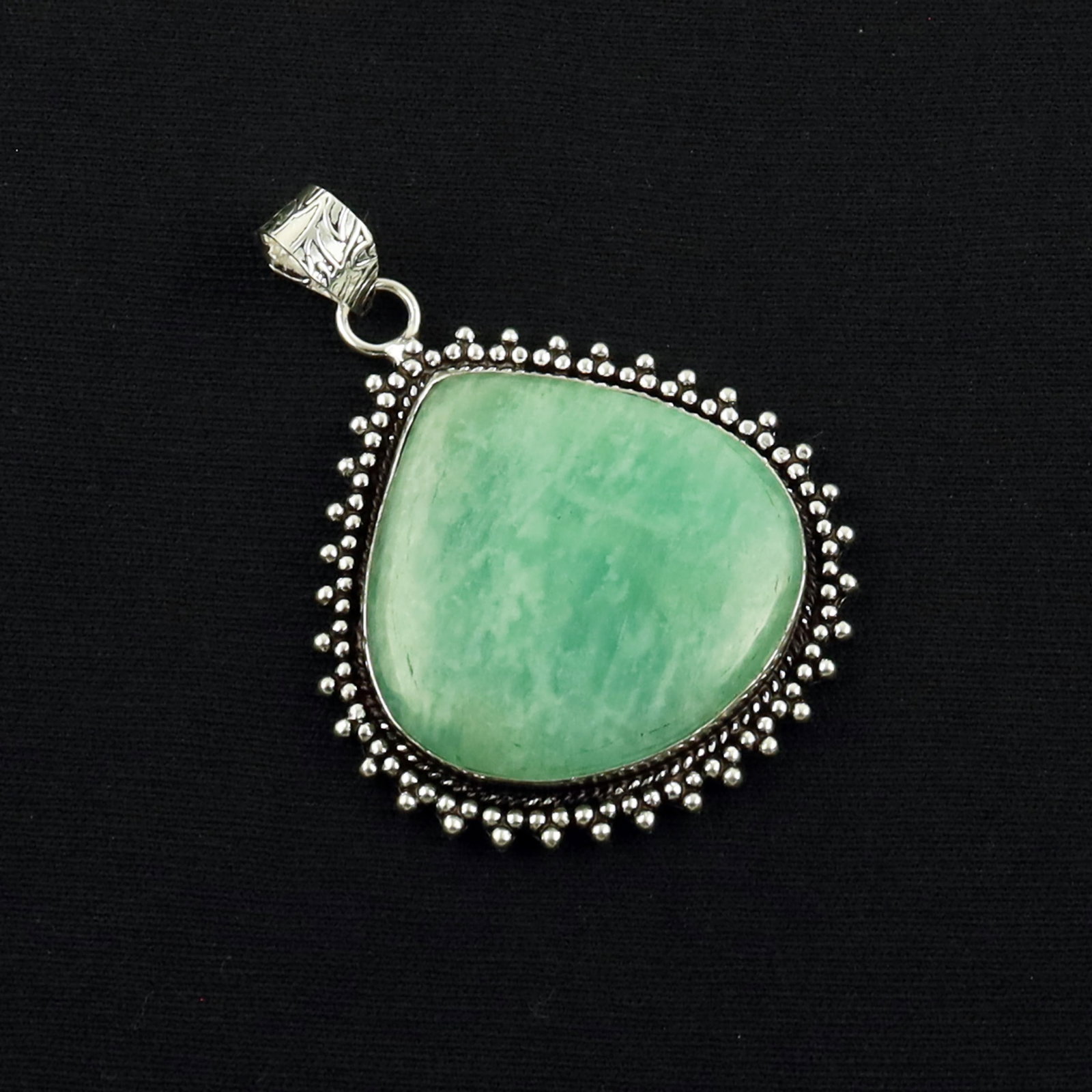 Natural Amazonite Sterling Silver Plated Handmade Pendant: Product ID: 260619171425 Product - Handmade Silver Plated Pendant Metal - 92.5 Sterling Silver Plated Pendant Size - 3.5X3 CM Gemstone - Amazonite Gemstone Origin - Brazil Gemstone Shape - Pear Pendan