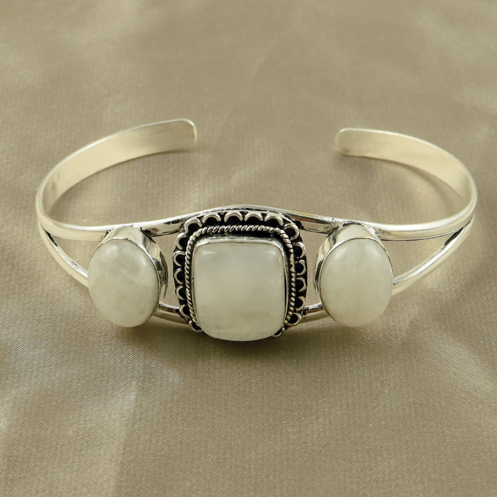 Natural Rainbow Moonstone Silver Plated Handmade Cuff Bangle: Product ID: 260521154829 Product - Handmade Silver Plated Cuff Bangle Metal - 92.5 Sterling Silver Plated Bangle Size - 7.5x5.5 CM (Adjustable) Gemstone - Rainbow Moonstone Gemstone Origin - India Gem