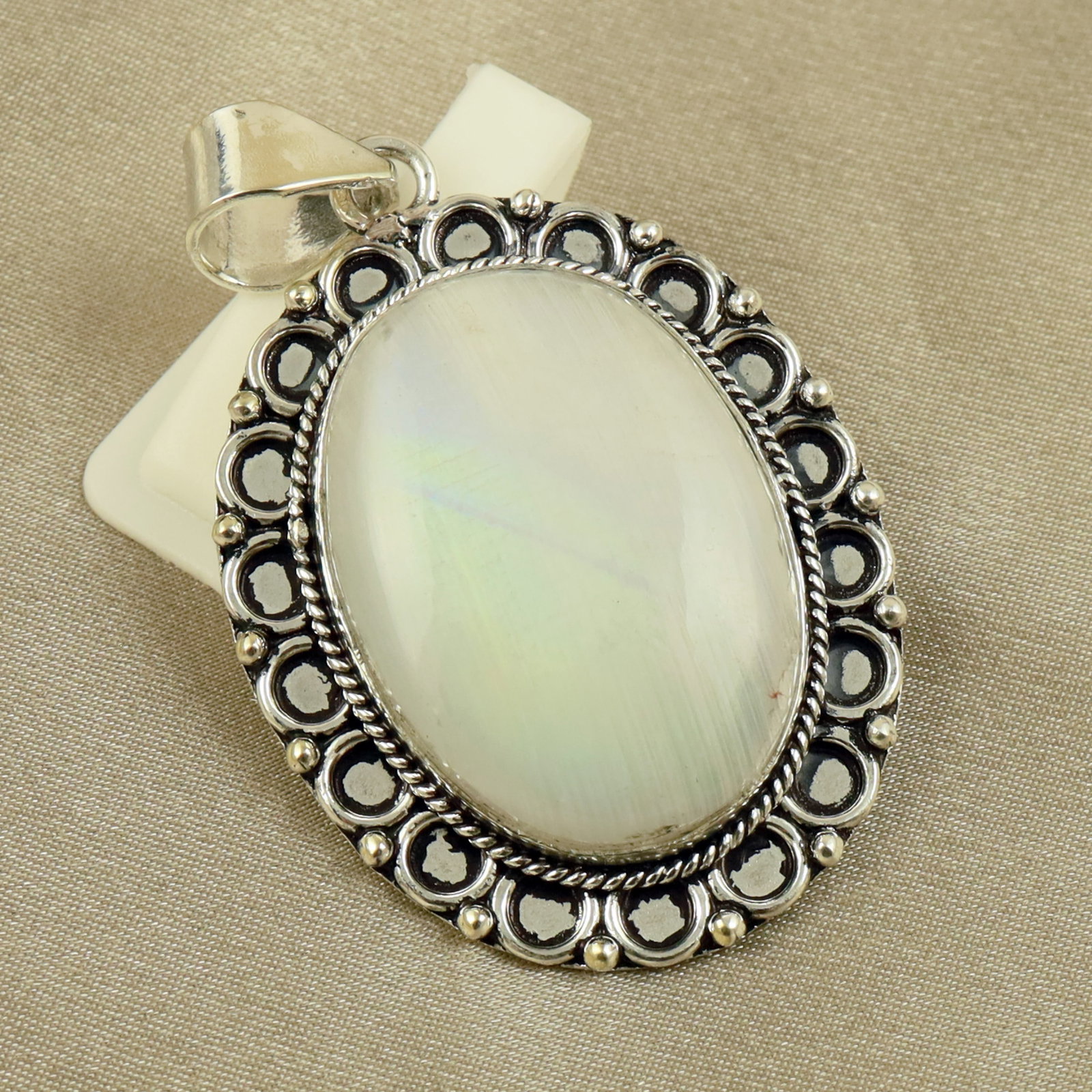 Natural Rainbow Moonstone Sterling Silver Plated Handmade Pendant: Product ID: 260518130257 Product - Handmade Silver Plated Pendant Metal - 92.5 Sterling Silver Plated Pendant Size - 4x3CM Gemstone - Rainbow Moonstone Gemstone Origin - India Gemstone Shape - Oval Pe