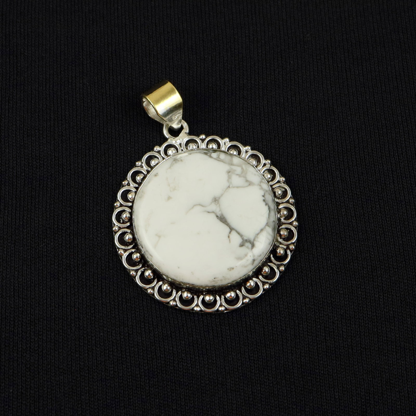 Natural Howlite Sterling Silver Plated Handmade Pendant: Product ID: 260517184043 Product - Handmade Silver Plated Pendant Metal - 92.5 Sterling Silver Plated Pendant Size - 4 CM Gemstone - Howlite Gemstone Origin - Canada Gemstone Shape - Round Pendant Wei