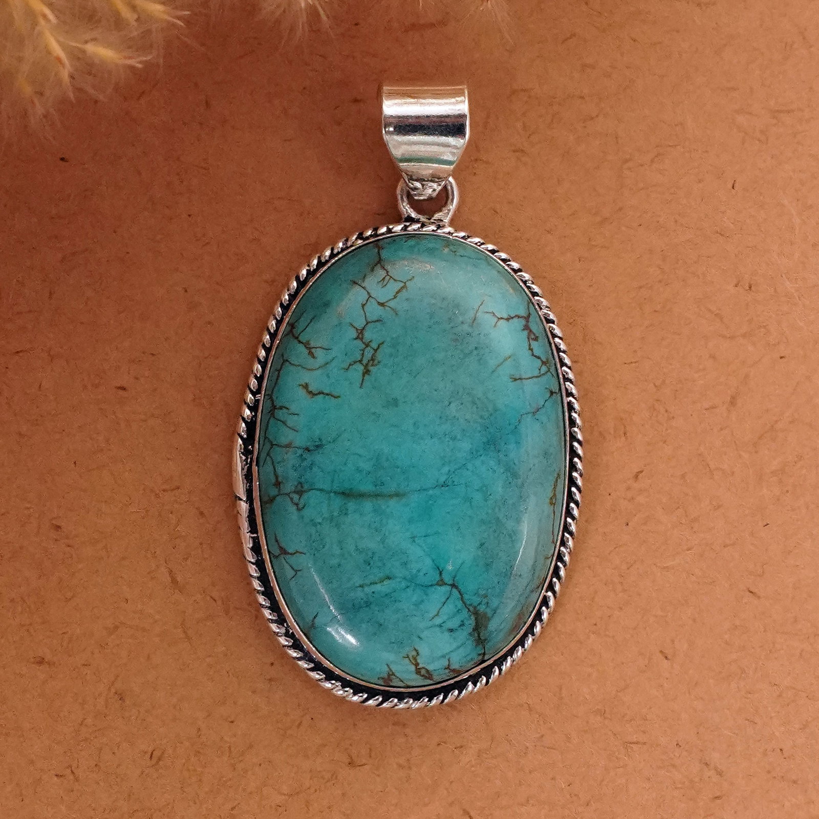 Natural Turquoise Sterling Silver Plated Handmade Pendant: Product ID: 260411135458 Product - Handmade Silver Plated Pendant Metal - 92.5 Sterling Silver Plated Pendant Size - 4x3 CM Gemstone - Turquoise Gemstone Origin - Tibet Gemstone Shape - Oval Pendant W