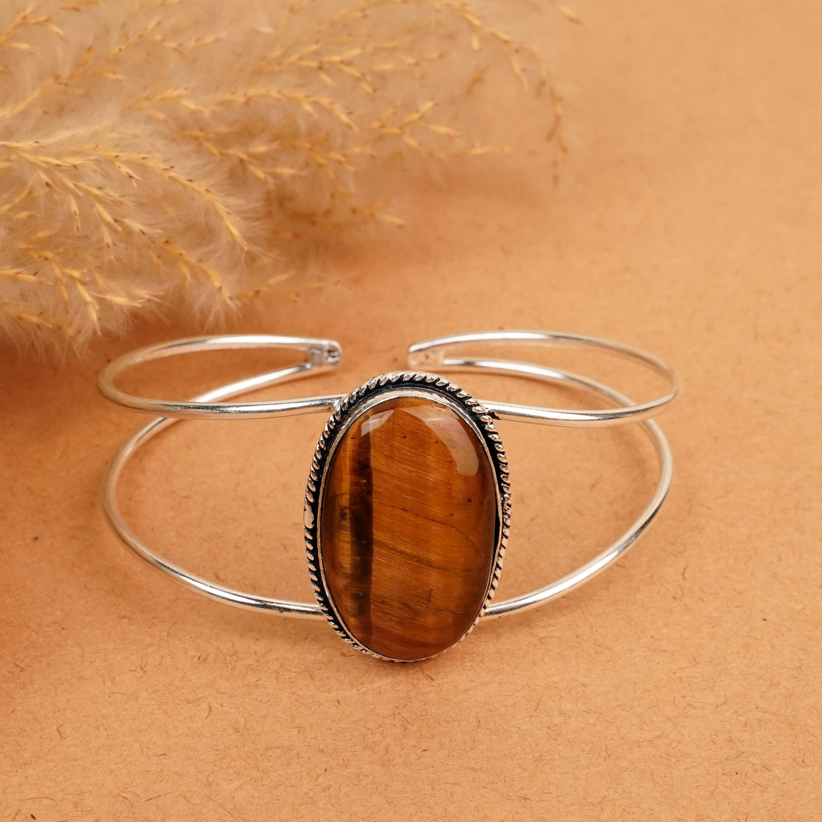 Natural Tiger Eye Sterling Silver Plated Handmade Cuff Bangle: Product ID: 260412131524 Product - Handmade Silver Plated Cuff Bangle Metal - 92.5 Sterling Silver Plated Bangle Size - 7.5x5.5 CM (Adjustable) Gemstone -Tiger Eye Gemstone Origin - South Africa Gemst