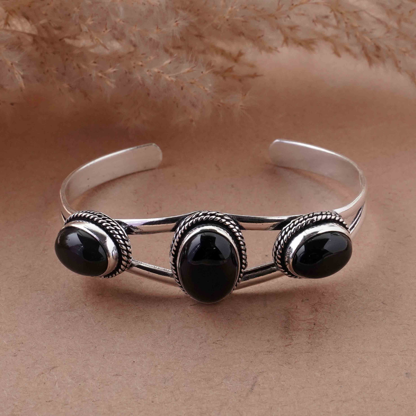 Natural Black Onyx Sterling Silver Plated Handmade Cuff Bangle: Product ID: 260429152346 Product - Handmade Silver Plated Cuff Bangle Metal - 92.5 Sterling Silver Plated Bangle Size - 6.5x4.5 CM (Adjustable) Gemstone - Black Onyx Gemstone Origin - India Gemstone S