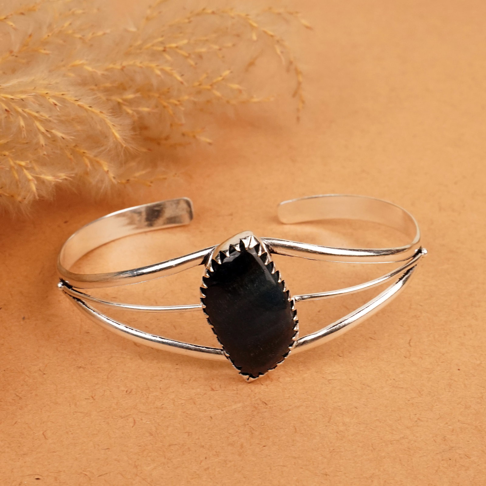 Natural Black Tiger Eye Sterling Silver Plated Handmade Cuff Bangle: Product ID: 260412133027 Product - Handmade Silver Plated Cuff Bangle Metal - 92.5 Sterling Silver Plated Bangle Size - 7.5x5.5 CM (Adjustable) Gemstone - Black Tiger Eye Gemstone Origin - South Afric
