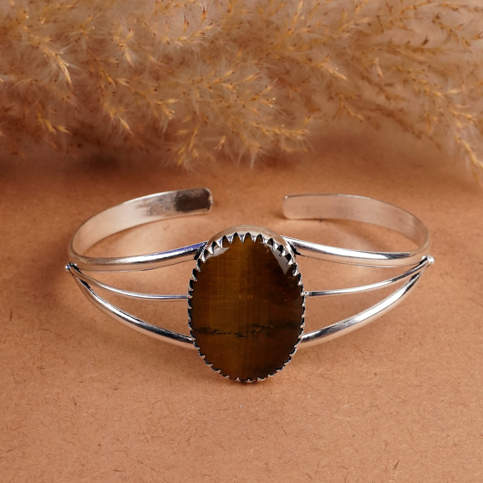 Natural Tiger Eye Sterling Silver Plated Handmade Cuff Bangle: Product ID: 260408141403 Product - Handmade Silver Plated Cuff Bangle Metal - 92.5 Sterling Silver Plated Bangle Size - 7.5x5.5 CM (Adjustable) Gemstone - Tiger Eye Gemstone Origin - South Africa Gems