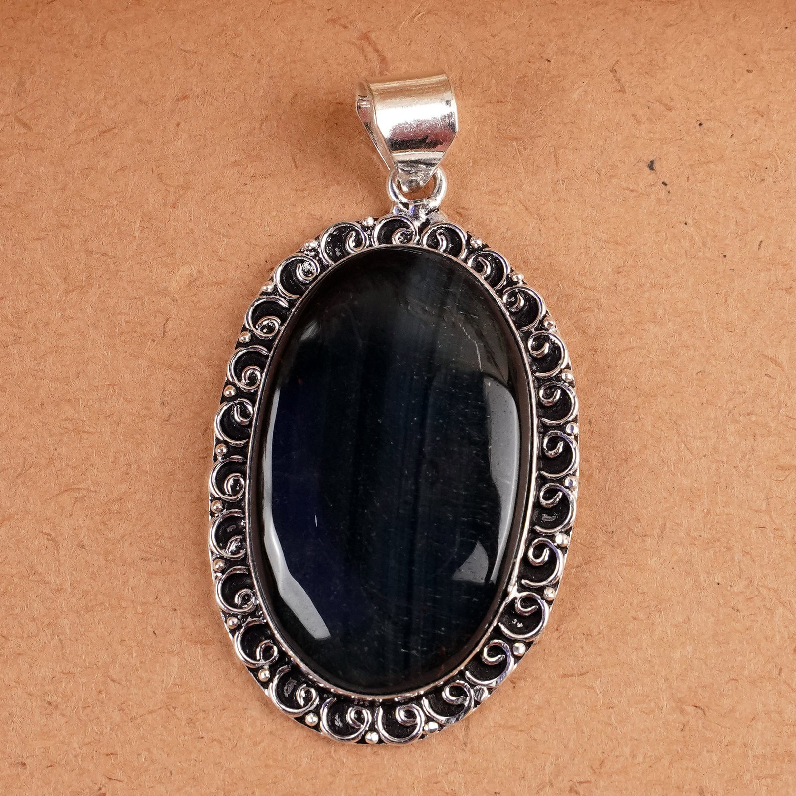 Natural Blue Tiger Eye Sterling Silver Plated Handmade Pendant: Product ID: 260407164959 Product - Handmade Silver Plated Pendant Metal - 92.5 Sterling Silver Plated Pendant Size - 4.5x3 CM Gemstone - Blue Tiger Eye Gemstone Origin - South Africa Gemstone Shape - 