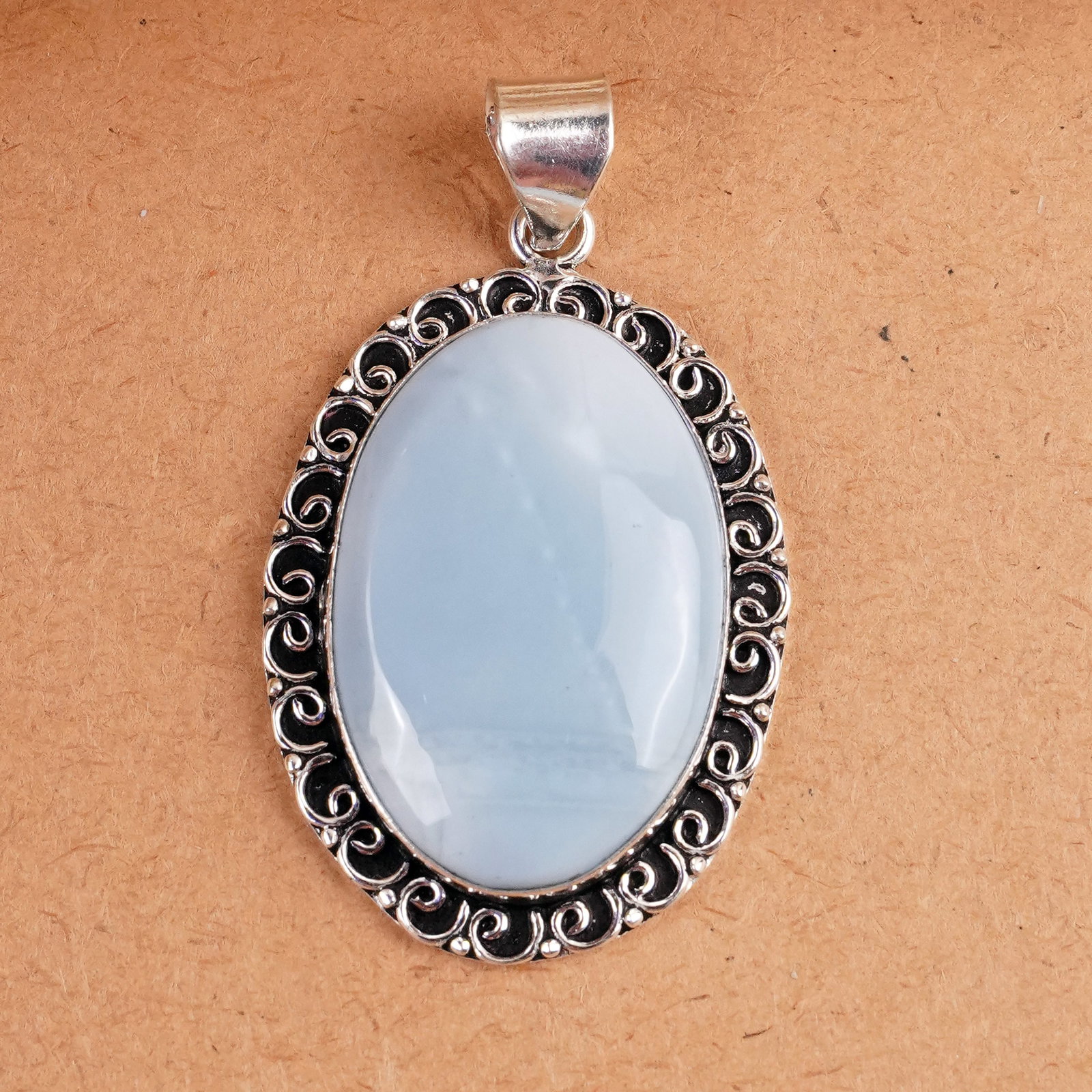 Natural Blue Opal Sterling Silver Plated Handmade Pendant: Product ID: 260407162958 Product - Handmade Silver Plated Pendant Metal - 92.5 Sterling Silver Plated Pendant Size - 4x3 CM Gemstone - Blue Opal Gemstone Origin - Indonesia Gemstone Shape - Oval Penda