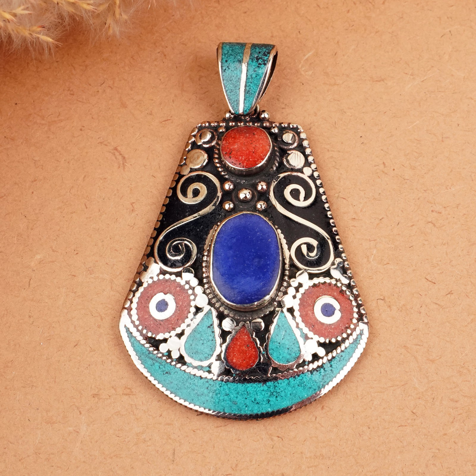 Tibetan Turquoise, Coral & Black Onyx & Lapis Handmade Pendant: Product ID: 260407150736 Product - Tibetan Handmade Ethnic Pendant Gemstone - Natural Turquoise & Coral & Black Onyx & Lapis Pendant Size - 6.5X4.5 CM Pendant Weight - 26 Gram Metal - Brass & Copper m