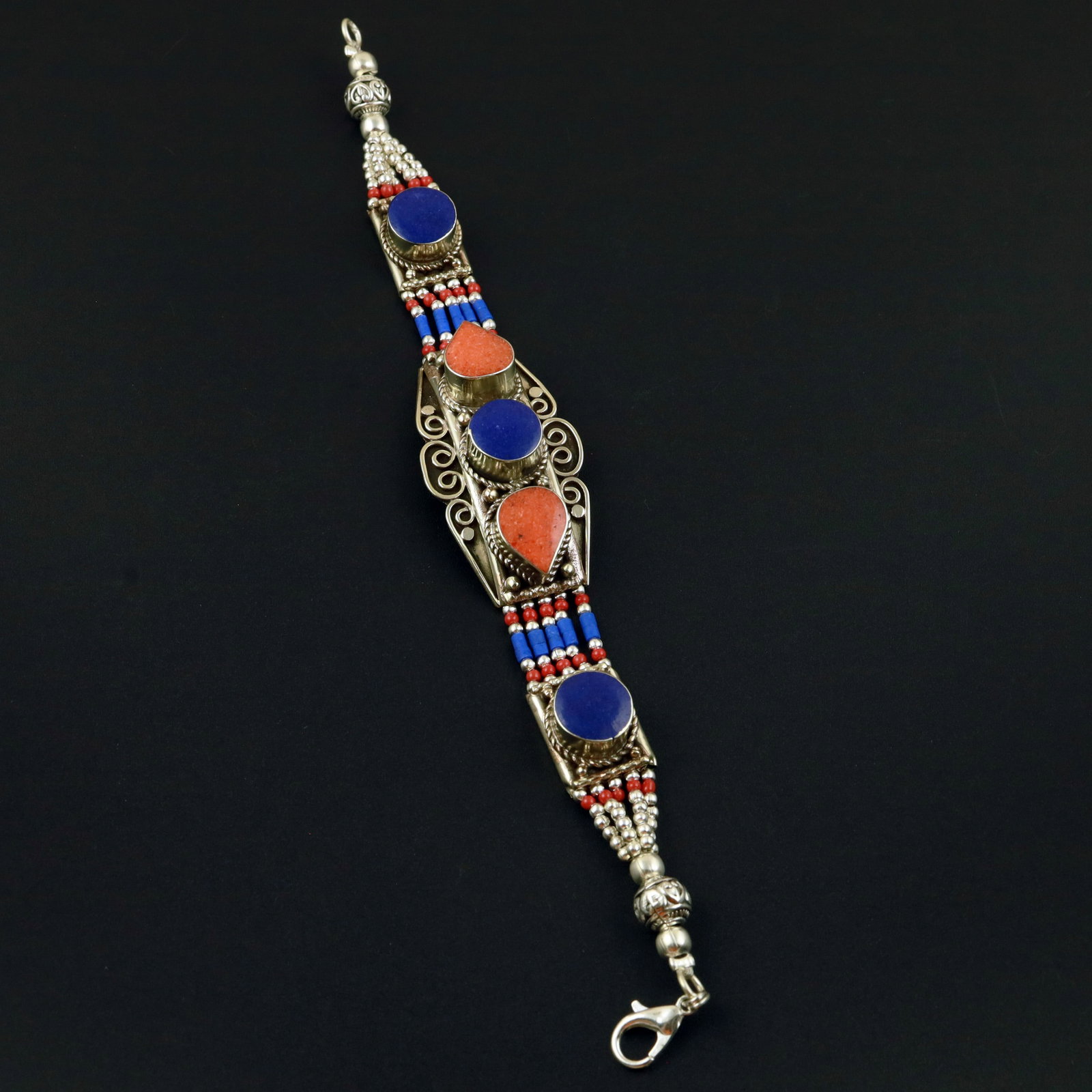 Afghani Lapis Lazuli & Tibetan Coral Handmade Bracelet: Product ID: 260513130410 Product - Tibetan Handmade Ethnic Bracelet Gemstone - Natural Lapis Lazuli & Coral Size - 7 Inch Weight - 50 Gram Approx Metal - Brass & Copper mix Metal Origin - Nepal Countr