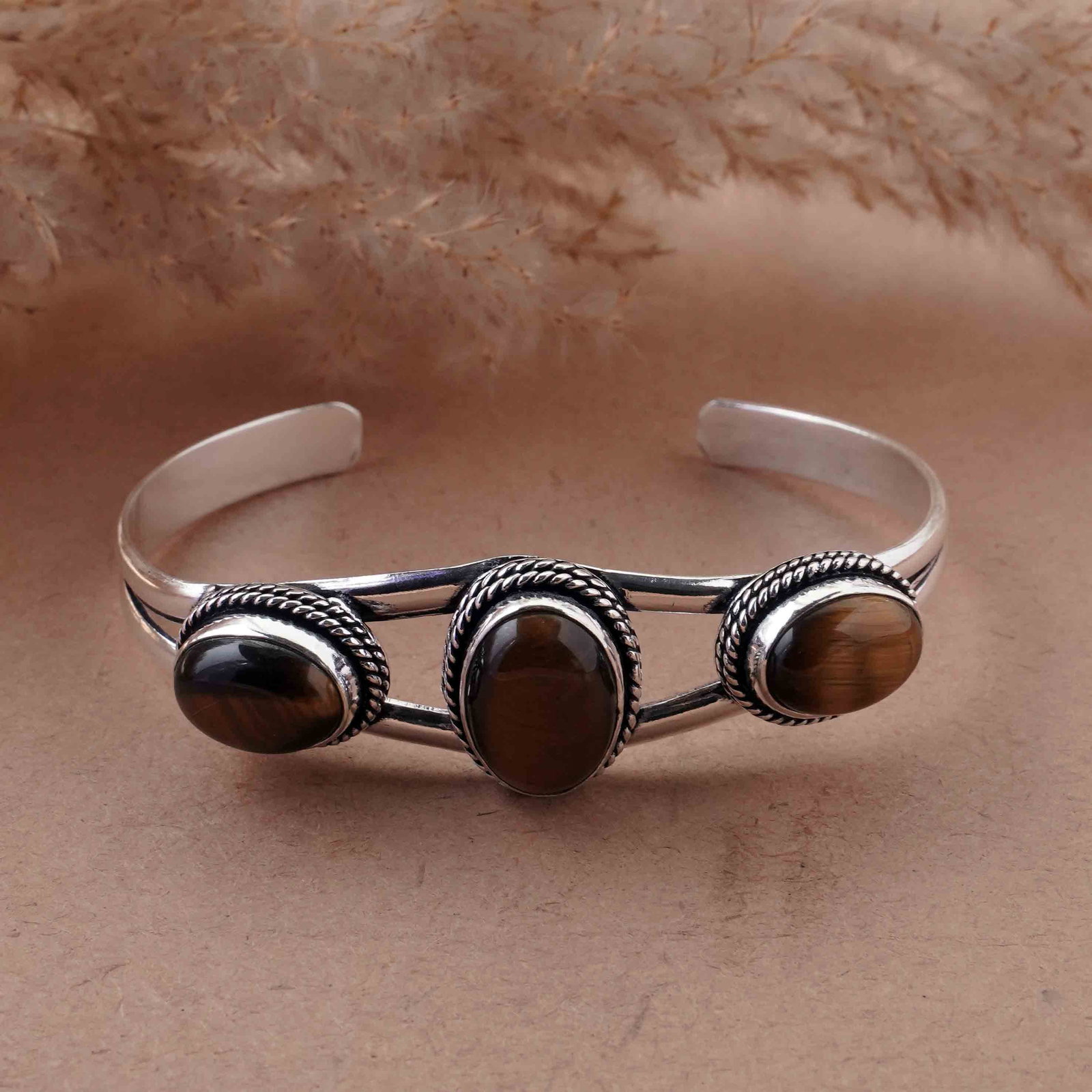 Natural Tiger Eye Sterling Silver Plated Handmade Cuff Bangle: Product ID: 260429151543 Product - Handmade Silver Plated Cuff Bangle Metal - 92.5 Sterling Silver Plated Bangle Size - 6.5x4.5 CM (Adjustable) Gemstone - Tiger Eye Gemstone Origin - South Africa Gems