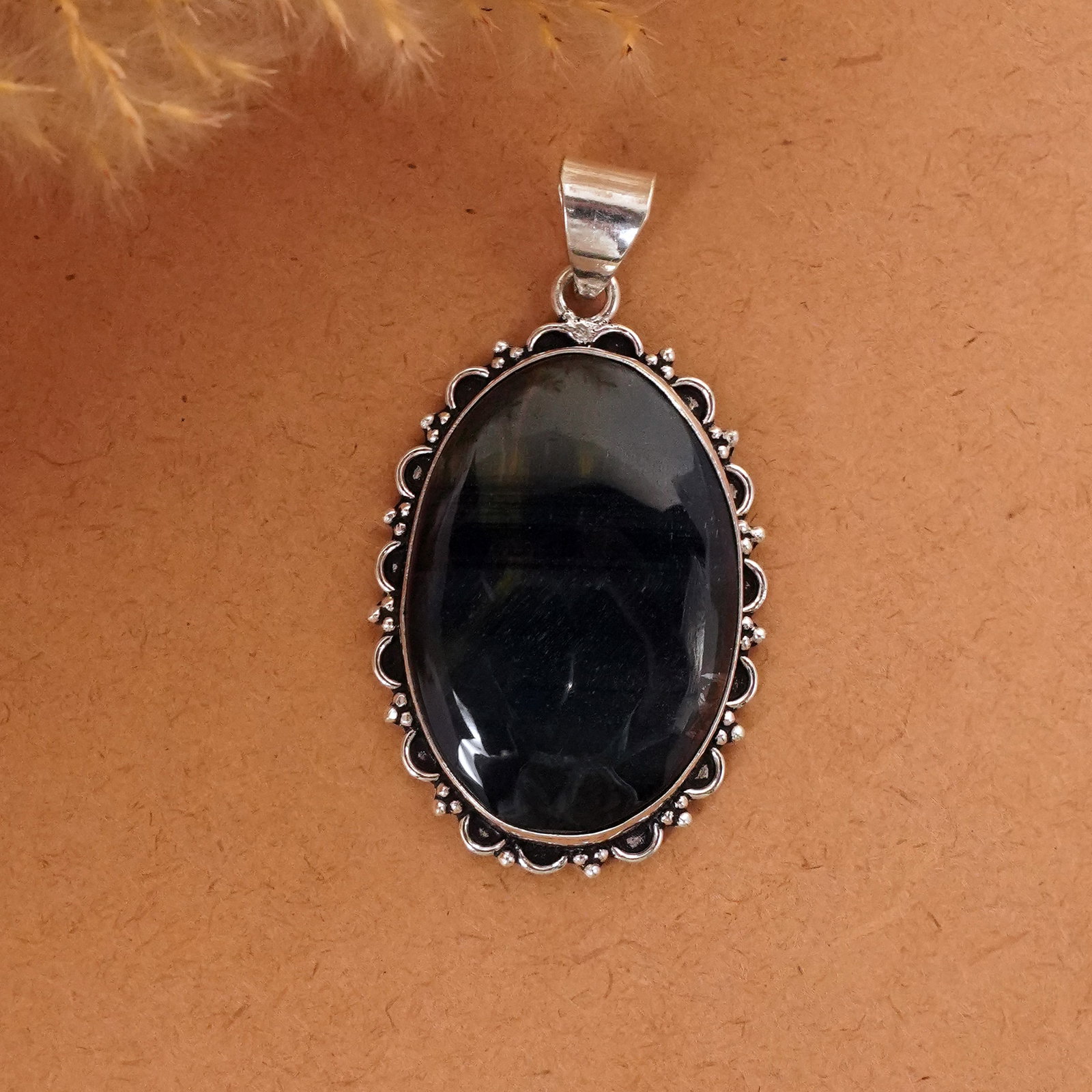Natural Black Tiger Eye Sterling Silver Plated Handmade Pendant: Product ID: 260411132740 Product - Handmade Silver Plated Pendant Metal - 92.5 Sterling Silver Plated Pendant Size - 4x3 CM Gemstone - Black Tiger Eye Gemstone Origin - South Africa Gemstone Shape - O