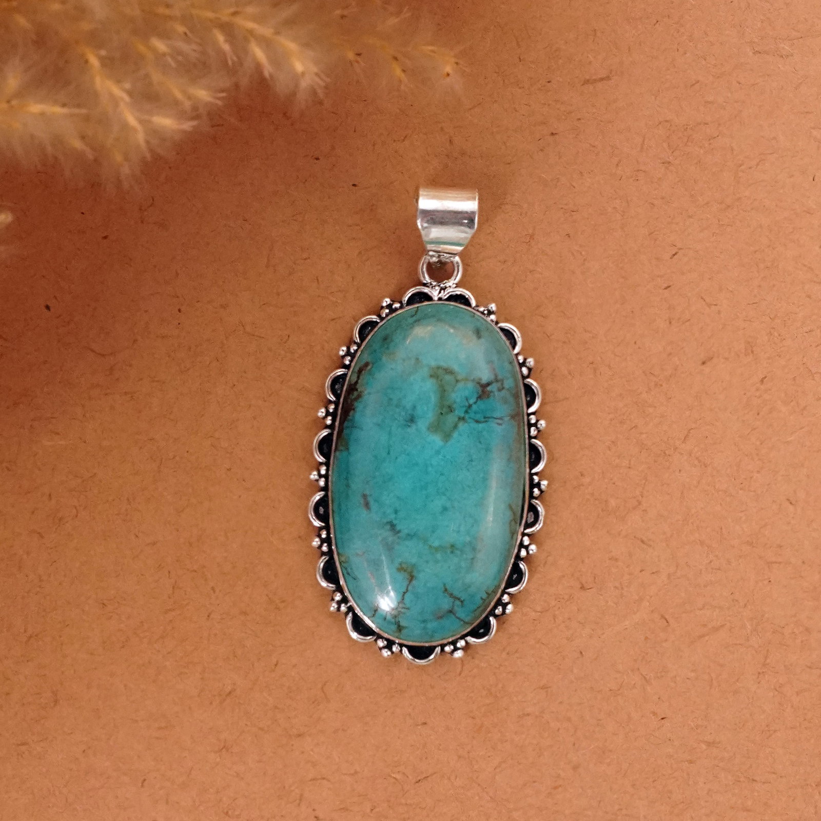 Natural Turquoise Sterling Silver Plated Handmade Pendant: Product ID: 260411132655 Product - Handmade Silver Plated Pendant Metal - 92.5 Sterling Silver Plated Pendant Size - 4.5x3 CM Gemstone - Turquoise Gemstone Origin - Tibet Gemstone Shape - Oval Pendant