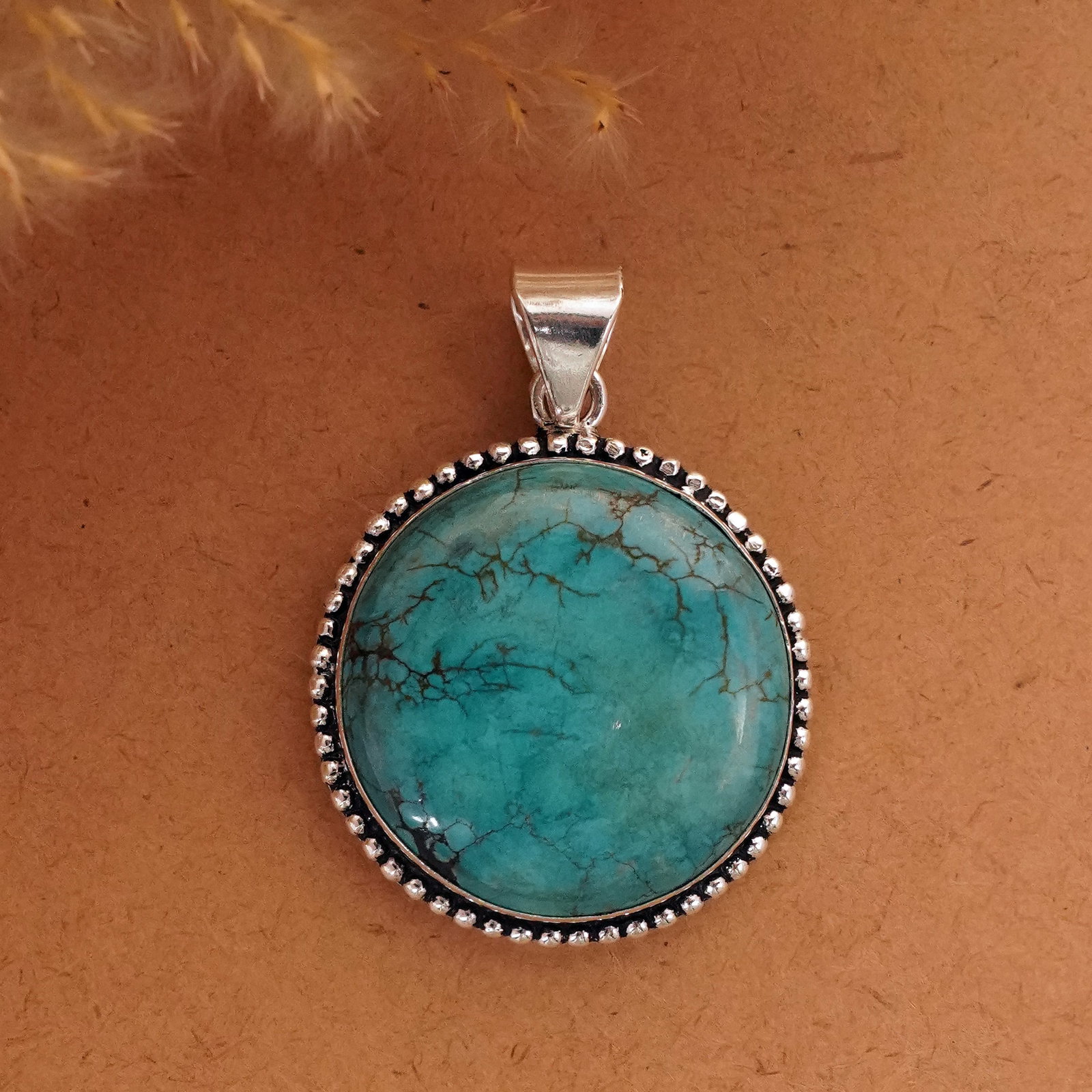 Natural Turquoise Sterling Silver Plated Handmade Pendant: Product ID: 260411130122 Product - Handmade Silver Plated Pendant Metal - 92.5 Sterling Silver Plated Pendant Size -3.5 CM Gemstone - Turquoise Gemstone Origin - Tibet Gemstone Shape - Round Pendant W