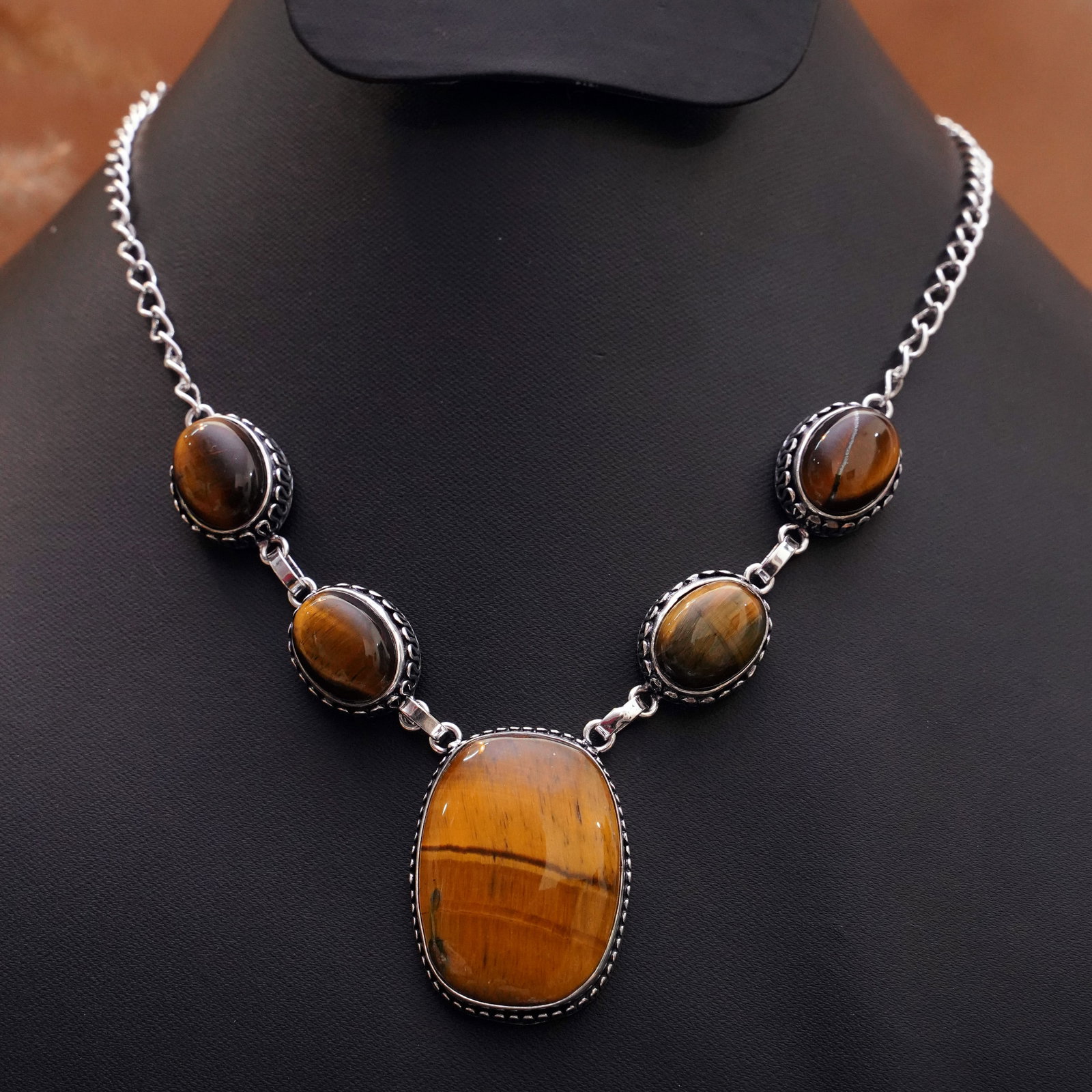Natural Tiger Eye Sterling Silver Plated Handmade Necklace: Product ID: 260409132529 Product - Handmade Silver Plated Necklace Metal - 92.5 Sterling Silver Plated Necklace Length - 18 Inch Gemstone - Tiger Eye Gemstone Size - 12X16 MM (4 Stone), 24X18 MM (1 St