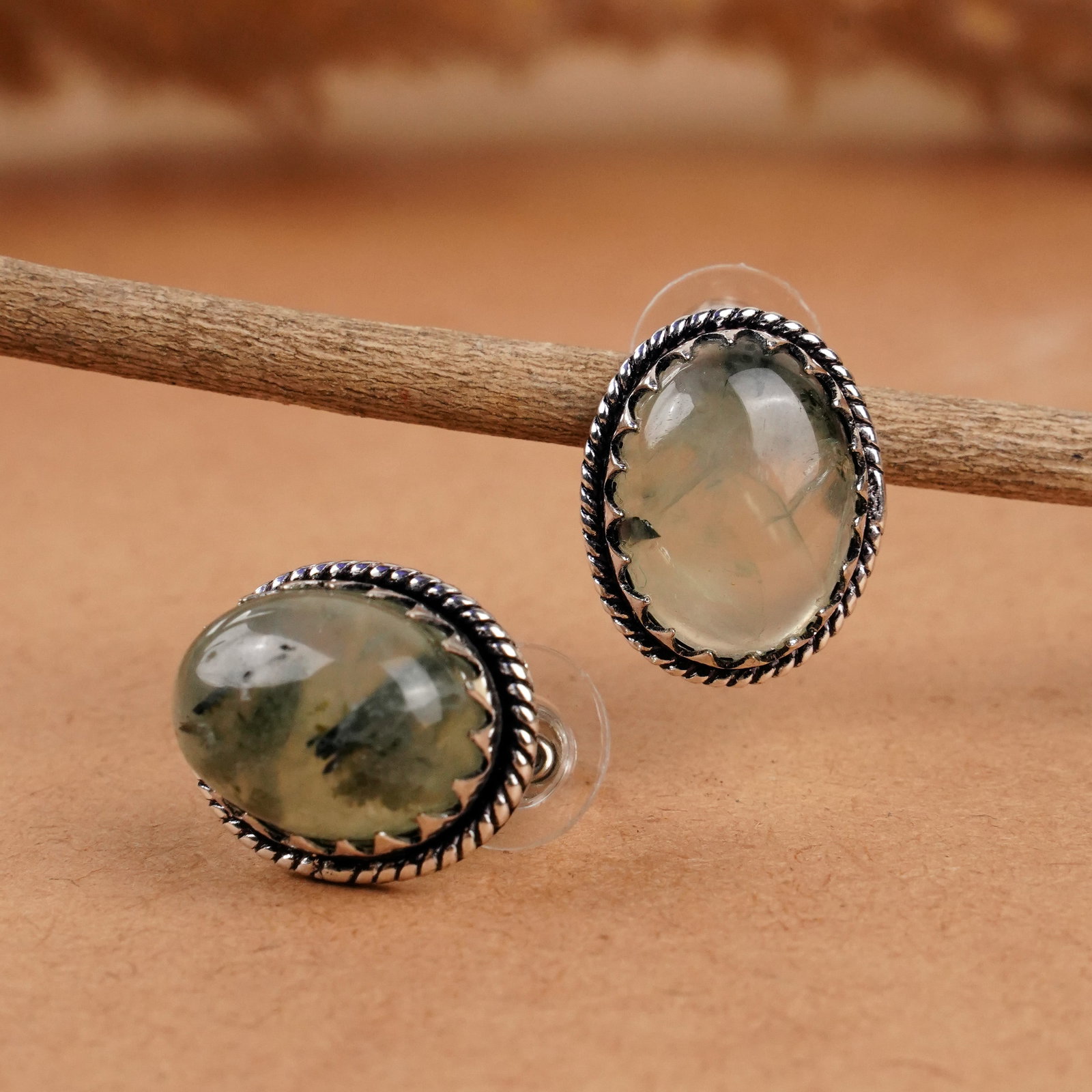 Natural Prehnite Sterling Silver Plated Handmade Stud Earring: Product ID: 260406141856 Product - Handmade Silver Plated Stud Earring Metal - 92.5 Sterling Silver Plated Earring Type - Stud Gemstone - Prehnite Gemstone Origin - South Africa Gemstone Size - 12X16 