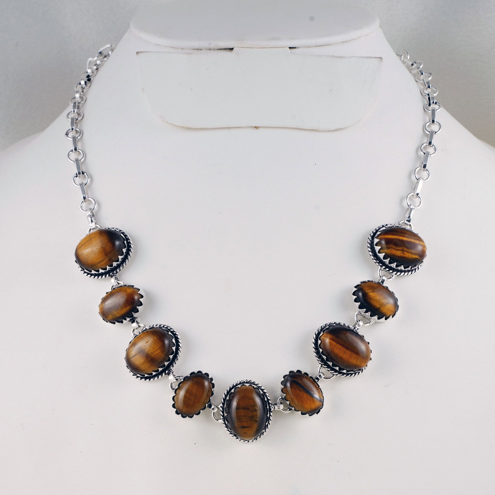 Natural Tiger Eye Sterling Silver Plated Handmade Necklace: Product ID: 260402185849 Product - Handmade Silver Plated Necklace Metal - 92.5 Sterling Silver Plated Necklace Length - 18 Inch Gemstone - Tiger Eye Gemstone Size - 12X16 MM (5 Stone), 10X14 MM (4 St
