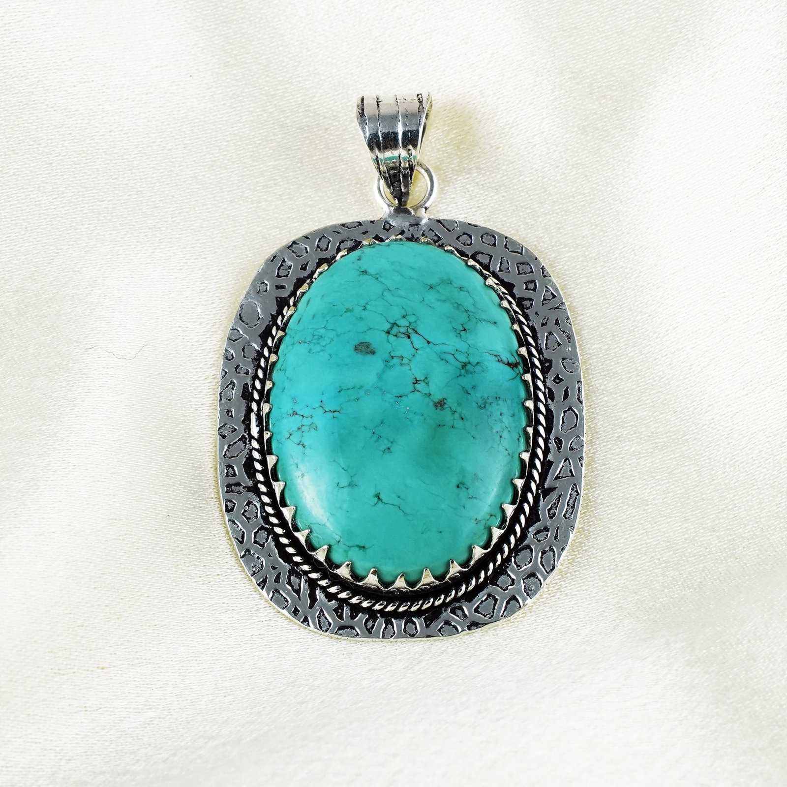 Natural Turquoise Sterling Silver Plated Handmade Pendant: Product ID: 260401133956 Product - Handmade Silver Plated Pendant Metal - 92.5 Sterling Silver Plated Pendant Size - 3.5x3 CM Gemstone - Turquoise Gemstone Origin - Tibet Gemstone Shape - Oval Pendant