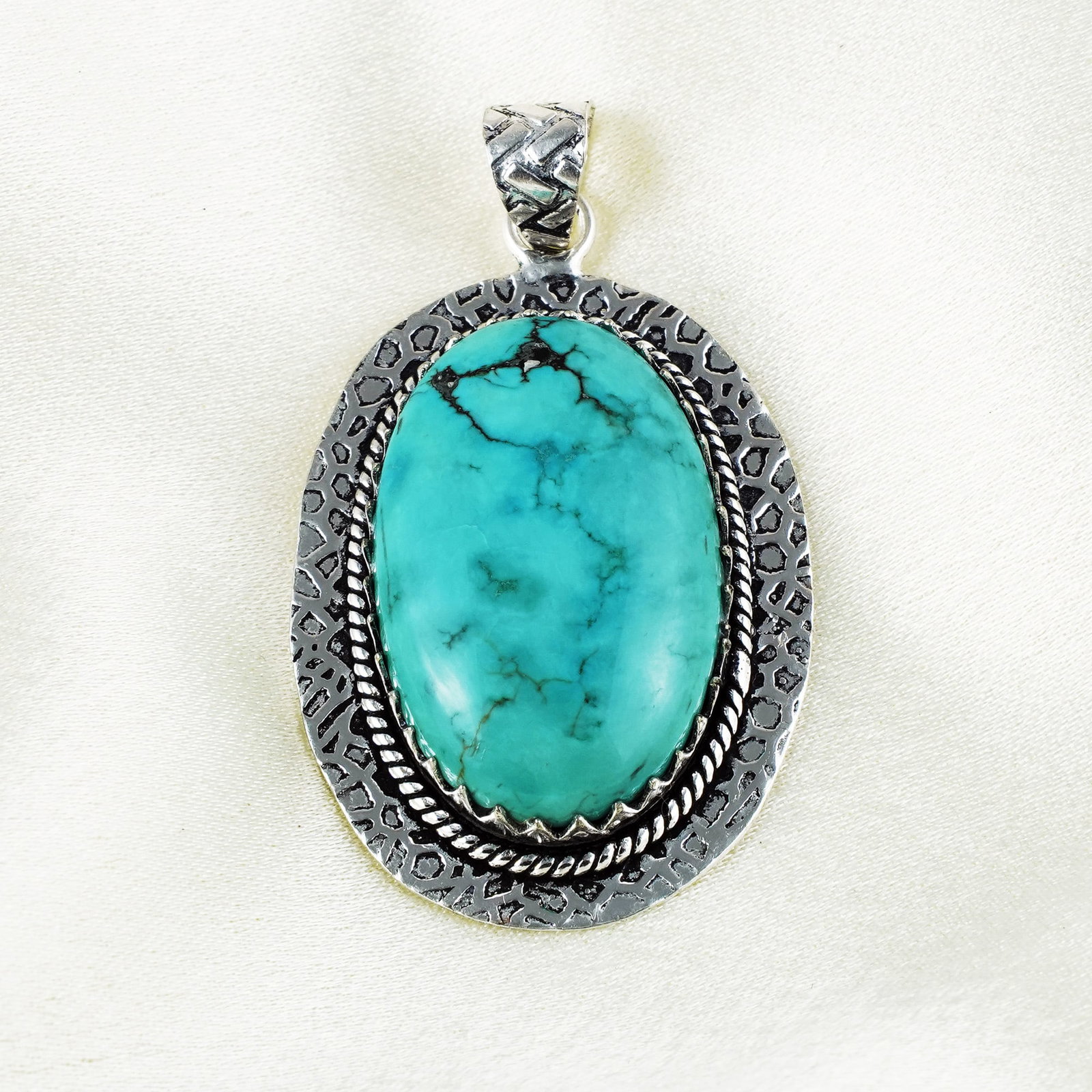 Natural Turquoise Sterling Silver Plated Handmade Pendant: Product ID: 260401134613 Product - Handmade Silver Plated Pendant Metal - 92.5 Sterling Silver Plated Pendant Size - 4x3 CM Gemstone - Turquoise Gemstone Origin - Tibet Gemstone Shape - Oval Pendant W