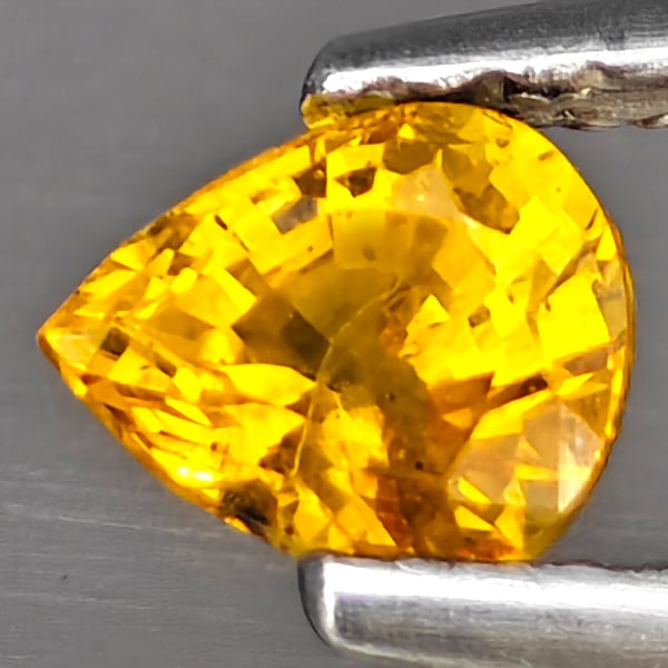 Natural Orange Songea Sapphire Gemstones 0.61 Ct. Pear Shape 5.3 x 4.4 Mm.: Product ID: 806163016 Product Name: Natural Orange Sapphire Weight: 0.61 CT. Size: 5.3 x 4.4 x 3.9 MM. Shape: Pear Shape Color: Orange Clarity:SI1 Luster: Good Gems Origin: Tanzania Treatment: Heated 
