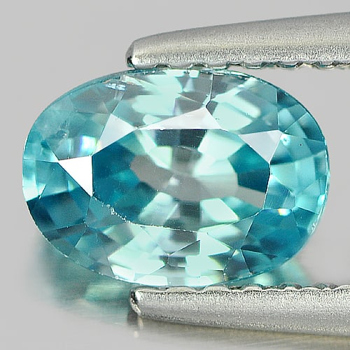 Natural Blue Zircon Gemstones 1.34 Ct. Oval Shape 7.2 x 5 Mm.: Product ID: 807719922 Product Name: Natural Zircon Weight: 1.34 CT. Size: 7.2 x 5 x 3.5 MM. Shape: Oval Color: Blue Clarity:SI Luster: Good Gems Origin: Cambodia Treatment: Heated Crystal Structure: T