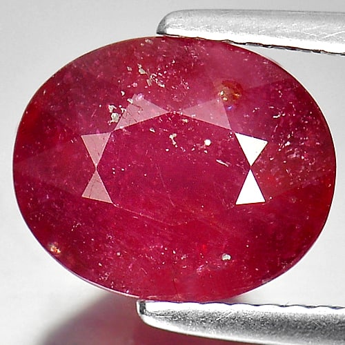 Natural Purplish Red Ruby 5.24 Ct. Oval Shape 10.4 x 8.5 Mm Gemstone from Madagascar: Product ID: 805927409 Product Name: Natural Ruby Weight: 5.24 CT. Size: 10.4 x 8.5 x 6.4 MM. Shape: Oval Color: Purplish Red Clarity:VSI Luster: Good Gems Origin: Madagascar Treatment: Heated (Lead-gl
