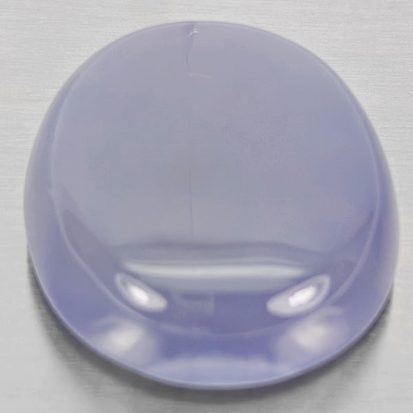 Natural Lavender Chalcedony Gemstones 42.98 Ct. Oval Cabochon Shape 24 x 22 Mm.: Product ID: 801502665 Product Name: Natural Chalcedony Weight: 42.98 CT. Size: 24 x 22 x 9.8 MM. Shape: Oval Cabochon Color: Lavender Clarity:Semi - Transparent Luster: Good Gems Origin: Russia Treatm