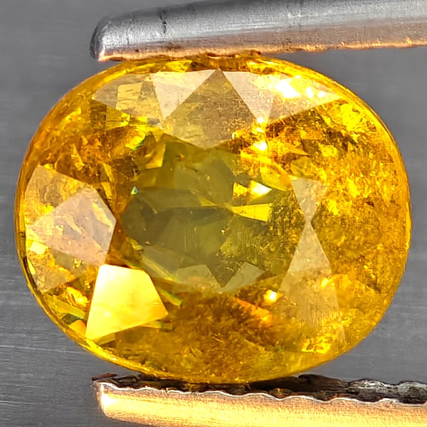 Natural Multi-Color Sphene Gemstones With Rainbow Spark 1.99 Ct. Oval Shape 7.8 x 6.7 Mm.: Product ID: 806509105 Product Name: Natural Sphene Weight: 1.99 CT. Size: 7.8 x 6.7 x 4.6 MM. Shape: Oval Shape Color: Multi-Color Clarity:SI1 Luster: Good Gems Origin: Madagascar Treatment: Unheated 
