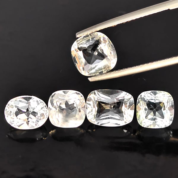 Natural White Topaz Gemstones 10.52 Ct. 5 Pcs. Mixed Shape 9.2 x 7.1 Mm.: Product ID: 807168821 Product Name: Natural Topaz Weight: 10.52 CT. Size: 9.2 x 7.1 x 5 to 8.2 x 6.4 x 5 MM. Shape: Mixed Shape Color: White Clarity:SI1 Luster: Good Gems Origin: Brazil Treatment: Unh