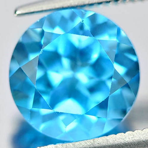 Natural Swiss Blue Topaz Gemstones 3.87 Ct. Round Shape 9.1 Mm.: Product ID: 807156359 Product Name: Natural Blue Topaz Weight: 3.87 CT. Size: 9.1 x 9.1 x 6.5 MM. Shape: Round Color: Swiss Blue Clarity:VVS Luster: Good Gems Origin: Brazil Treatment: Treated Crystal