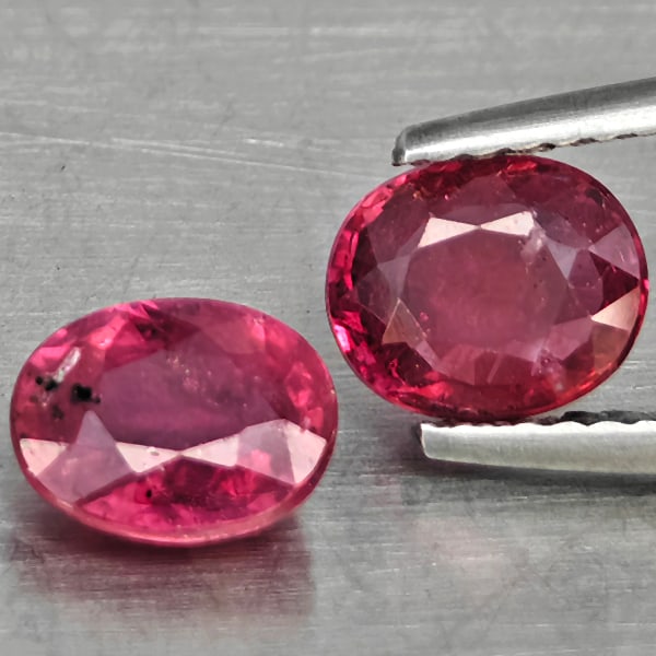 Natural Pinkish Red Ruby Gemstones 1.80 Ct. 2 Pcs. Oval Shape 6.8 x 5.6 Mm.: Product ID: 805935981 Product Name: Natural Ruby Weight: 1.80 CT. Size: 6.8 x 5.6 x 2.9 MM. Shape: Oval Shape Color: Pinkish Red Clarity:SI1 Luster: Good Gems Origin: Madagascar Treatment: Heated (Lea