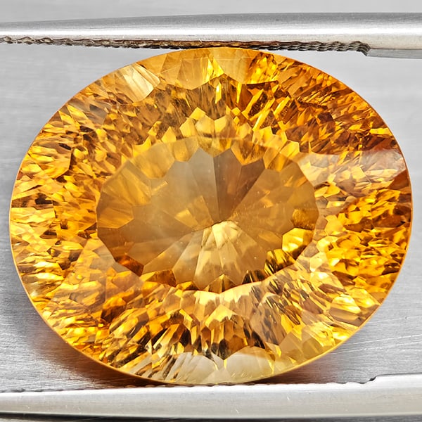 Natural Imperial Topaz Gemstones 17.78 Ct. Oval Concave Cut 17.5 x 14.7 Mm.: Product ID: 807168638 Product Name: Natural Topaz Weight: 17.78 CT. Size: 17.5 x 14.7 x 10 MM. Shape: Oval Shape Color: Imperial Clarity:VSI Luster: Good Gems Origin: Brazil Treatment: Treated Crystal