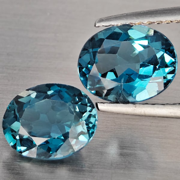 Natural London Blue Topaz Gemstones 4.40 Ct. 2 Pcs. Oval Shape 9.1 x 7.2 Mm.: Product ID: 807168913 Product Name: Natural Blue Topaz Weight: 4.40 CT. Size: 9.1 x 7.2 x 4.9 MM. Shape: Oval Color: London Blue Clarity:SI1 Luster: Good Gems Origin: Brazil Treatment: Treated Crystal