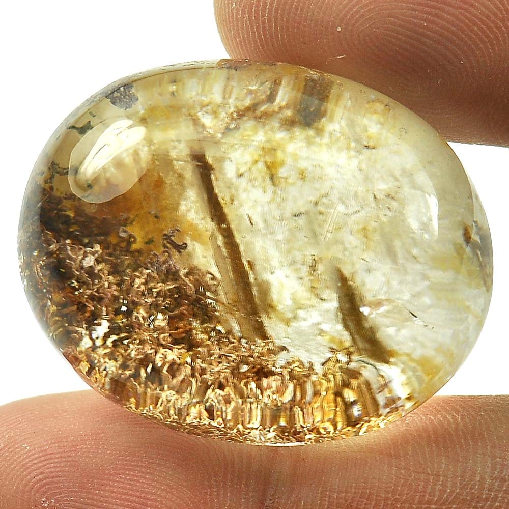Natural Moss Quartz Gemstone 93.36 Ct. Oval Cabochon Shape 31 x 24 Mm.: Product ID: 805529212 Product Name: Natural Quartz Weight: 93.36 CT. Size: 31 x 24 x 18.7 MM. Shape: Oval Cabochon Color: White Clarity:Semi - Transparent Luster: Good Gems Origin: Thailand Treatment: