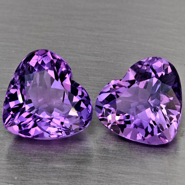 Natural Purple Amethyst Gemstones 6.74 Ct. 2 Pcs. Heart Shape 10.6 x 10 Mm.: Product ID: 800325601 Product Name: Natural Amethyst Weight: 6.74 CT. Size: 10.6 x 10 x 6.5 MM. Shape: Heart Shape Color: Purple Clarity:VVS Luster: Very Good Gems Origin: Brazil Treatment: Unheated C