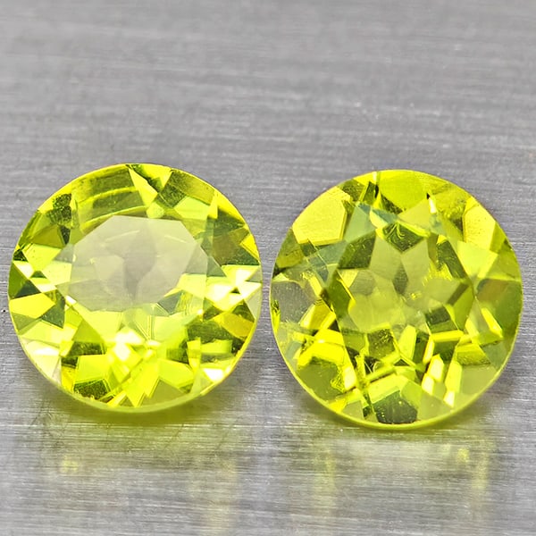 Natural Green Peridot Gemstones 1.14 Ct. 2 Pcs. Round Shape 5.3 Mm.: Product ID: 805317589 Product Name: Natural Peridot Weight: 1.14 CT. Size: 5.3 x 5.3 x 3 MM. Shape: Round Color: Green Clarity:VSI Luster: Good Gems Origin: Pakistan Treatment: Unheated Crystal Struct