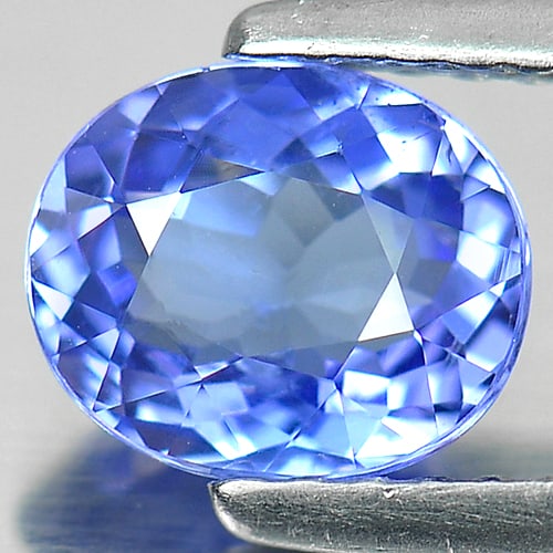 Natural Violetish Blue Tanzanite Gemstones 1.06 Ct. Oval Shape 6.91 x 5.81 Mm.: Product ID: 807005765 Product Name: Natural Tanzanite Weight: 1.06 CT. Size: 6.91 x 5.81 x 3.53 MM. Shape: Oval Color: Blue Clarity:VSI Luster: Good Gems Origin: Tanzania Treatment: Heated Crystal Str