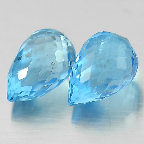 Natural Blue Topaz Gemstones 1.90 Ct. 2 Pcs. Briolette Shape 6.5 x 4.2 Mm.: Product ID: 807151216 Product Name: Natural Blue Topaz Weight: 1.90 CT. Size: 6.5 x 4.2 x 4.2 MM. Shape: Briolette Color: Blue Clarity:VSI Luster: Good Gems Origin: Brazil Treatment: Treated Crystal S