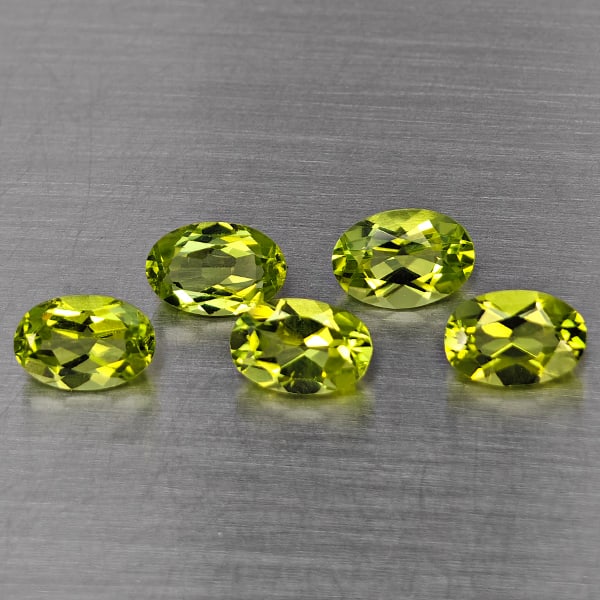 Natural Green Peridot Gemstones 2.92 Ct. 5 Pcs. Oval Shape 6.2 x 4.2 Mm.: Product ID: 805317751 Product Name: Natural Peridot Weight: 2.92 CT. Size: 6.2 x 4.2 x 3.2 MM. Shape: Oval Shape Color: Green Clarity:VSI Luster: Good Gems Origin: Pakistan Treatment: Unheated Crystal