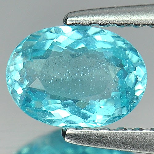 Natural Paraiba Color Apatite Gemstones 0.86 Ct. Oval Shape 7 x 5.2 Mm.: Product ID: 800613048 Product Name: Natural Apatite Weight: 0.86 CT. Size: 7 x 5.2 x 3 MM. Shape: Oval Color: Neon Blue Clarity:SI1 Luster: Good Gems Origin: Tanzania Treatment: Unheated Crystal Struc
