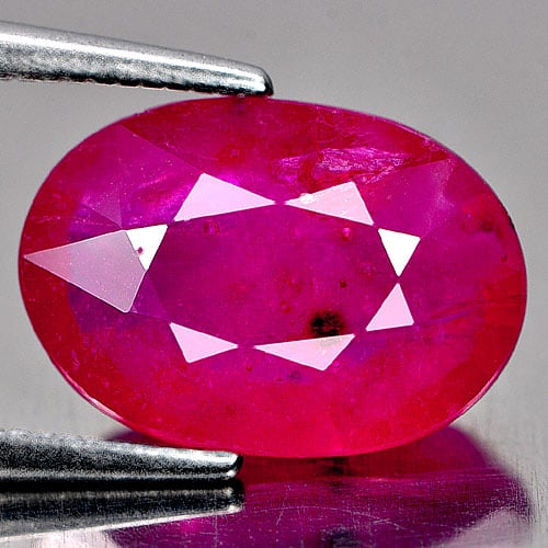 Natural Purplish Red Ruby Gemstones 4.62 Ct. Oval Shape 12.1 x 8.5 Mm.: Product ID: 805931198 Product Name: Natural Ruby Weight: 4.62 CT. Size: 12.1 x 8.5 x 4.7 MM. Shape: Oval Color: Purplish Red Clarity:SI2 Luster: Good Gems Origin: Madagascar Treatment: Heated Lead-gla