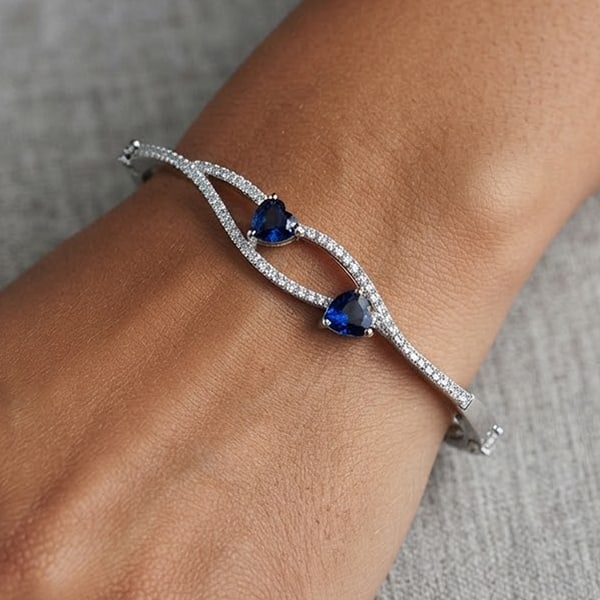 925 Sterling Silver Bangle Jewelry White Gold Plated Diameter 56 Mm.: Product ID: 280550091 Product Type: 925 Sterling Silver Fine Jewelry Jewelry Weight: 8.14 Grams. Gemstones Color: Silver Metal: Solid Silver 92.5%. Gemstone Detail: Heart Blue CZ Size 5 x 5 mm. 2 Pcs.
